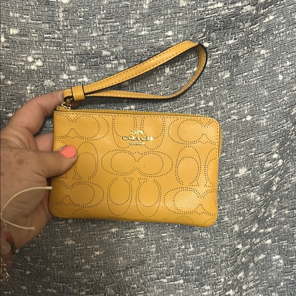 Coach Perforated Yellow Wristlet